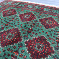 Green Bukhara rug 3.1m x 2m, hand-knotted, durable, traditional design, ideal for living rooms.