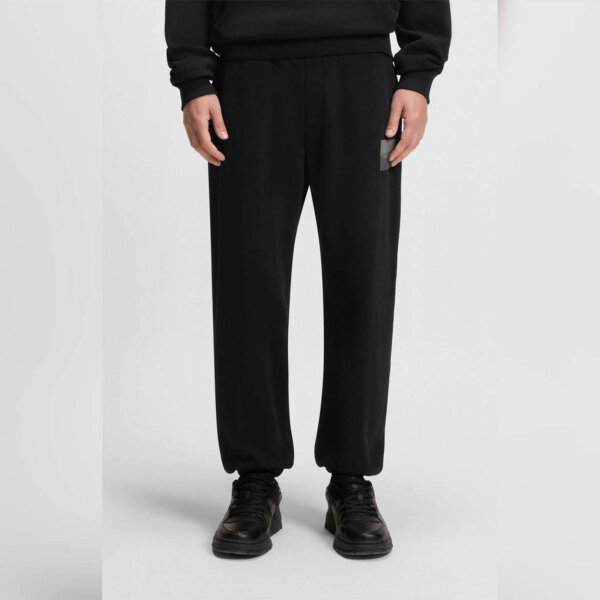 HUGO BOSS Jogginghose, EU S, Baumwoll-Terry, Schwarz, mit Split-Logo, bequem und stylisch.