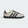 Adidas Samba OG, sneakers, classic design, leather upper, rubber outsole, ideal for leisure and sports.