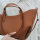 Polène Cyme Mini Handbag, Camel, grained leather, compact, elegant design, shoulder strap, high-quality workmanship