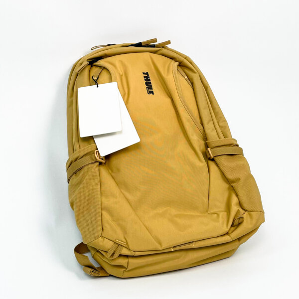 Thule Sweden backpack, padded back panel, adjustable chest strap, 2 bottle holders, gold/yellow, comfortable