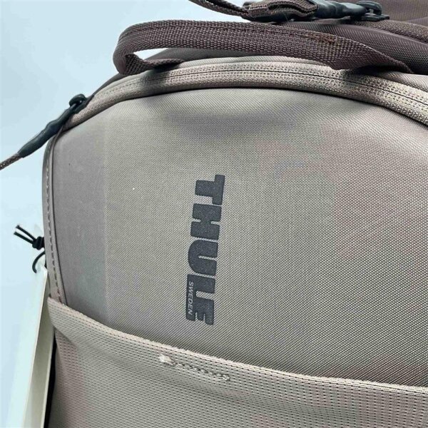 Thule Sweden backpack, 2 bottle holders, chest strap, padded back, purple/brown/beige, comfortable