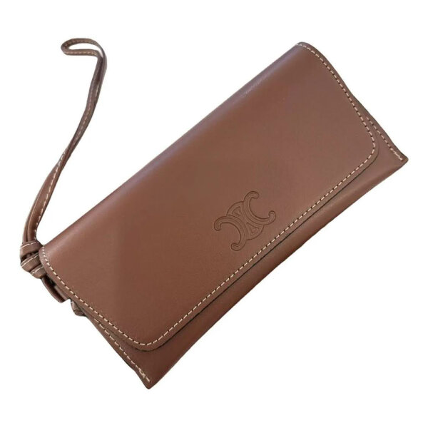 Celine Triomphe case, brown, accessory, compact design, fine leather, iconic Triomphe logo, stylish & practical