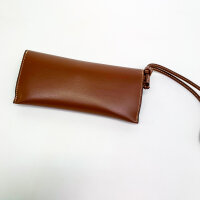 Celine Triomphe case, brown, accessory, compact design, fine leather, iconic Triomphe logo, stylish & practical