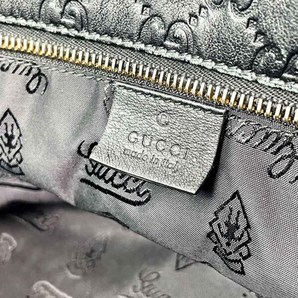 Gucci handbag, GG print, leather, black, pre-owned, shoulder bag, logo design, elegant look
