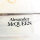 Alexander McQueen AM0243O-005 Womens Glasses 52-15-145 Transparent with purple accents