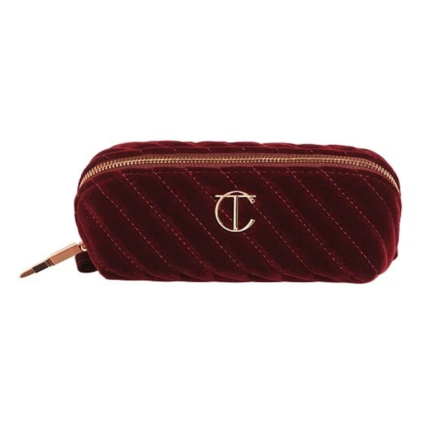 Charlotte Tilbury Mini Kosmetiktasche Organizer Burgunderrot mit 2 Lippenstiftfächern und goldfarbenem Reißverschluss