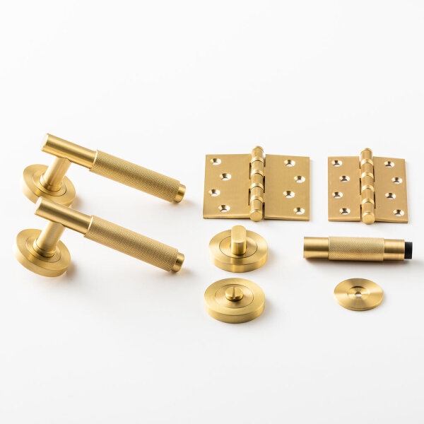 Karl Hoffmann Rock door handle set, 2 pieces, round rosettes, knurled handle, incl. mounting material, gold-colored