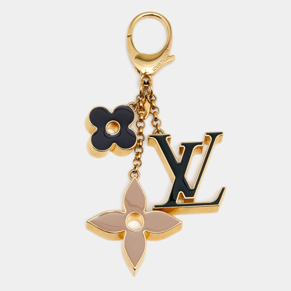 Louis Vuitton Fleur de Monogram, gold-tone key & bag charm, iconic floral design, elegant accessory