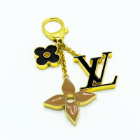 Louis Vuitton Fleur de Monogram, gold-tone key & bag charm, iconic floral design, elegant accessory