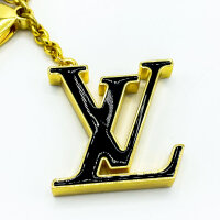 Louis Vuitton Fleur de Monogram, gold-tone key & bag charm, iconic floral design, elegant accessory
